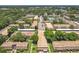 Expansive aerial view of the residential community, highlighting its layout and green spaces at 200 St Andrews Blvd # 911, Winter Park, FL 32792