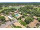 Aerial view showcasing a community, a pool, and nearby sports fields at 200 St Andrews Blvd # 911, Winter Park, FL 32792