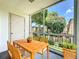 Outdoor patio featuring seating and beautiful views of the community at 200 St Andrews Blvd # 911, Winter Park, FL 32792