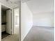 A spacious bedroom with neutral carpeting and ample closet space at 200 St Andrews Blvd # 911, Winter Park, FL 32792