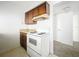 Kitchen has plenty of cabinet space, a stove, and lots of room for food preparation at 200 St Andrews Blvd # 911, Winter Park, FL 32792