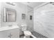 Beautiful bathroom featuring white marble shower with black mosaic floor at 2041 Dixie Belle Dr # 2041C, Orlando, FL 32812
