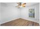 Bedroom featuring vinyl flooring, a ceiling fan, and a sunny window at 2041 Dixie Belle Dr # 2041C, Orlando, FL 32812