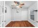 Bedroom with wood flooring, a ceiling fan, closet and a sunny window at 2041 Dixie Belle Dr # 2041C, Orlando, FL 32812