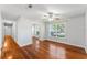 Bright and airy bedroom with hardwood floors, ceiling fan, and ample natural light at 2041 Dixie Belle Dr # 2041C, Orlando, FL 32812