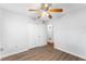 Bright bedroom features a ceiling fan, closet, and neutral walls to personalize with your style at 2041 Dixie Belle Dr # 2041C, Orlando, FL 32812