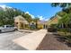 Inviting community clubhouse featuring well-kept landscaping, convenient parking, and a welcoming entrance at 2041 Dixie Belle Dr # 2041C, Orlando, FL 32812