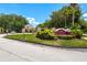 Welcoming entrance to the Mirada community, beautifully landscaped with vibrant signage, and well-maintained grounds at 2041 Dixie Belle Dr # 2041C, Orlando, FL 32812