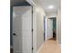 Hallway with multiple doorways and tile flooring at 2042 Hayfield Way, Apopka, FL 32712