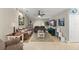 Spacious living room with tile flooring, comfortable couches, and a ceiling fan at 2042 Hayfield Way, Apopka, FL 32712