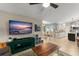 Open concept living room with view of dining area and kitchen at 2042 Hayfield Way, Apopka, FL 32712