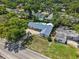 An aerial view of the property showcasing the home, pool, and neighborhood at 2220 Derbyshire Rd, Maitland, FL 32751