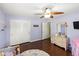 Bright and airy bedroom with laminate floors and ample closet space at 2220 Derbyshire Rd, Maitland, FL 32751