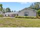 Inviting single Gathering home featuring manicured lawn and attractive exterior details at 2220 Derbyshire Rd, Maitland, FL 32751