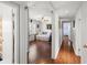 Hallway view into bonus room with a view of the front yard at 2220 Derbyshire Rd, Maitland, FL 32751