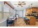 Eat-in kitchen features a breakfast bar, stainless steel appliances, and tile flooring at 2220 Derbyshire Rd, Maitland, FL 32751