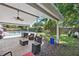 View of the fenced in backyard and pool from the covered patio area at 2220 Derbyshire Rd, Maitland, FL 32751