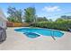 Backyard pool with spa and spacious patio area, perfect for outdoor relaxation and entertaining at 2220 Derbyshire Rd, Maitland, FL 32751