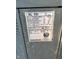 Close-up of the air conditioner's label displaying model and manufacturing information at 2302 Greenwood St St, Deltona, FL 32738