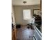 Kitchen with tile floor, oak colored cabinets, white appliances and a double window at 2302 Greenwood St St, Deltona, FL 32738