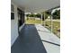 Covered back patio with concrete flooring and view of the backyard at 2302 Greenwood St St, Deltona, FL 32738