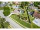 Home with a large yard and a screened pool in this aerial view at 245 Meadow Bay Ct, Lake Mary, FL 32746