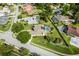 Home with large yard, screened pool and solar panels in this aerial view at 245 Meadow Bay Ct, Lake Mary, FL 32746