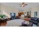 Spacious living room with views of the kitchen and the dining area at 245 Meadow Bay Ct, Lake Mary, FL 32746