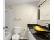 Bathroom featuring a vessel sink, updated fixtures, and a shower-tub combo at 247 Toms Rd, Debary, FL 32713