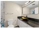 Bathroom featuring a vessel sink, updated fixtures, and a shower-tub combo at 247 Toms Rd, Debary, FL 32713