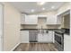 Updated kitchen with stainless steel appliances, modern cabinetry, and sleek countertops, offering a blend of style and functionality at 247 Toms Rd, Debary, FL 32713