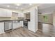 Well-lit kitchen featuring stainless steel appliances, contemporary cabinetry, and an open design, enhancing the home's appeal at 247 Toms Rd, Debary, FL 32713