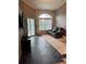 Cozy living room features large window and comfortable seating, creating a relaxing atmosphere at 2592 Grassy Point Dr # 306, Lake Mary, FL 32746