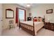 Relaxing bedroom features a comfortable bed, soft lighting, and a cozy ambiance at 3504 Cayugas Loop, St Cloud, FL 34772