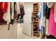 Organized walk-in closet with ample shelving and hanging space, perfect for storage at 3504 Cayugas Loop, St Cloud, FL 34772