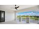Balcony with an amazing view of the lake, a ceiling fan, and a black railing at 4007 Grande Brick Loop # 13, Orlando, FL 32837