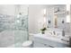Contemporary bathroom with a glass-enclosed shower, decorative tile, and stylish fixtures at 4007 Grande Brick Loop # 13, Orlando, FL 32837