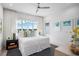 Bright bedroom features a large window, stylish decor, and a cozy, inviting atmosphere at 4007 Grande Brick Loop # 13, Orlando, FL 32837