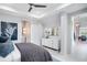 Stylish bedroom with a neutral color palette, modern furnishings, and an en suite bathroom at 4007 Grande Brick Loop # 13, Orlando, FL 32837