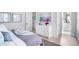 Spacious bedroom with a dresser and art; bathroom and closet are within view at 4007 Grande Brick Loop # 13, Orlando, FL 32837