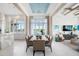 Formal dining room with modern chandelier, and view of the lake at 4007 Grande Brick Loop # 13, Orlando, FL 32837