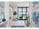 Inviting foyer with modern finishes, a view of the pool and golf course, and elegant decor at 4007 Grande Brick Loop # 13, Orlando, FL 32837