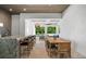 Outdoor living area with full kitchen, dining, bar, and lounge seating overlooking pool at 4007 Grande Brick Loop # 13, Orlando, FL 32837