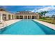 Stunning pool with bright blue water and a sprawling patio at this estate at 4007 Grande Brick Loop # 13, Orlando, FL 32837