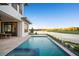 Pool with spa overlooking golf course; backyard features patio, and lush landscaping at 4007 Grande Brick Loop # 13, Orlando, FL 32837