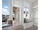 Spacious walk-in closet features custom shelving, seating and large windows with neighborhood views at 4007 Grande Brick Loop # 13, Orlando, FL 32837