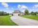 Charming two-story home with a well-manicured lawn and a spacious driveway at 412 Mallard Way, Kissimmee, FL 34759