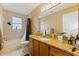 Bathroom with a granite countertop, tile floors, and tub/shower combo at 425 Sterling Lake Dr, Ocoee, FL 34761