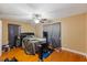 Bedroom with hardwood floors and ceiling fan at 425 Sterling Lake Dr, Ocoee, FL 34761