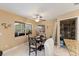 Cozy dining area with plenty of natural light, a pantry, and a view of the backyard at 425 Sterling Lake Dr, Ocoee, FL 34761